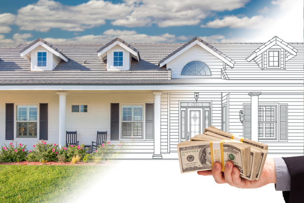 hand holding money in front of a house that is half-photo and half-drawn