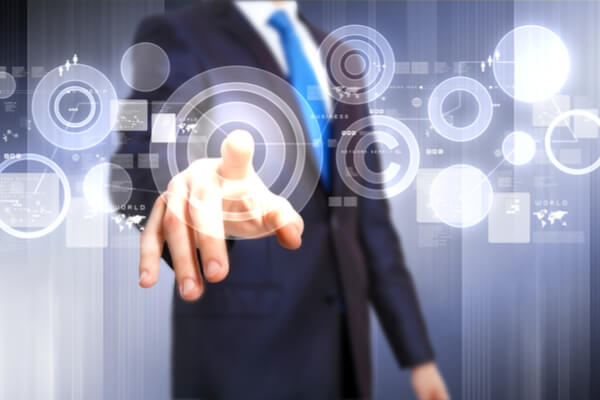 man in a suit points to a circle on a floating interface