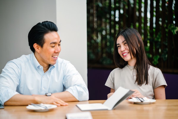 two people in a discussion